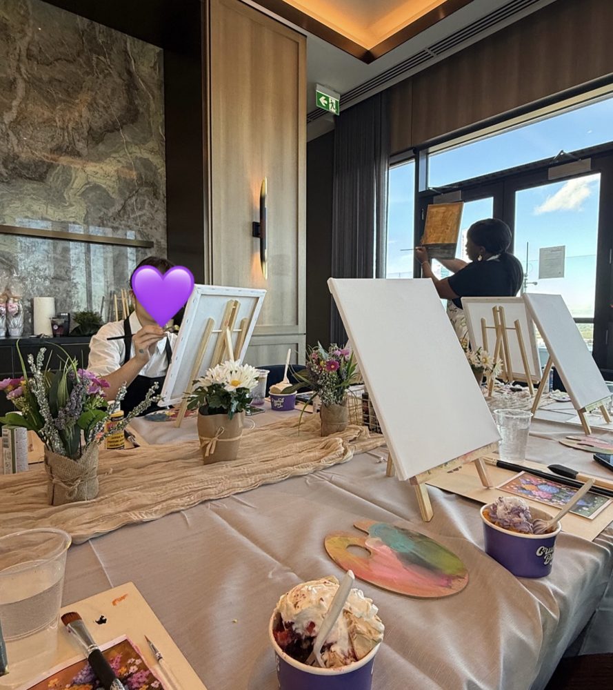 Paint night with a view of the city